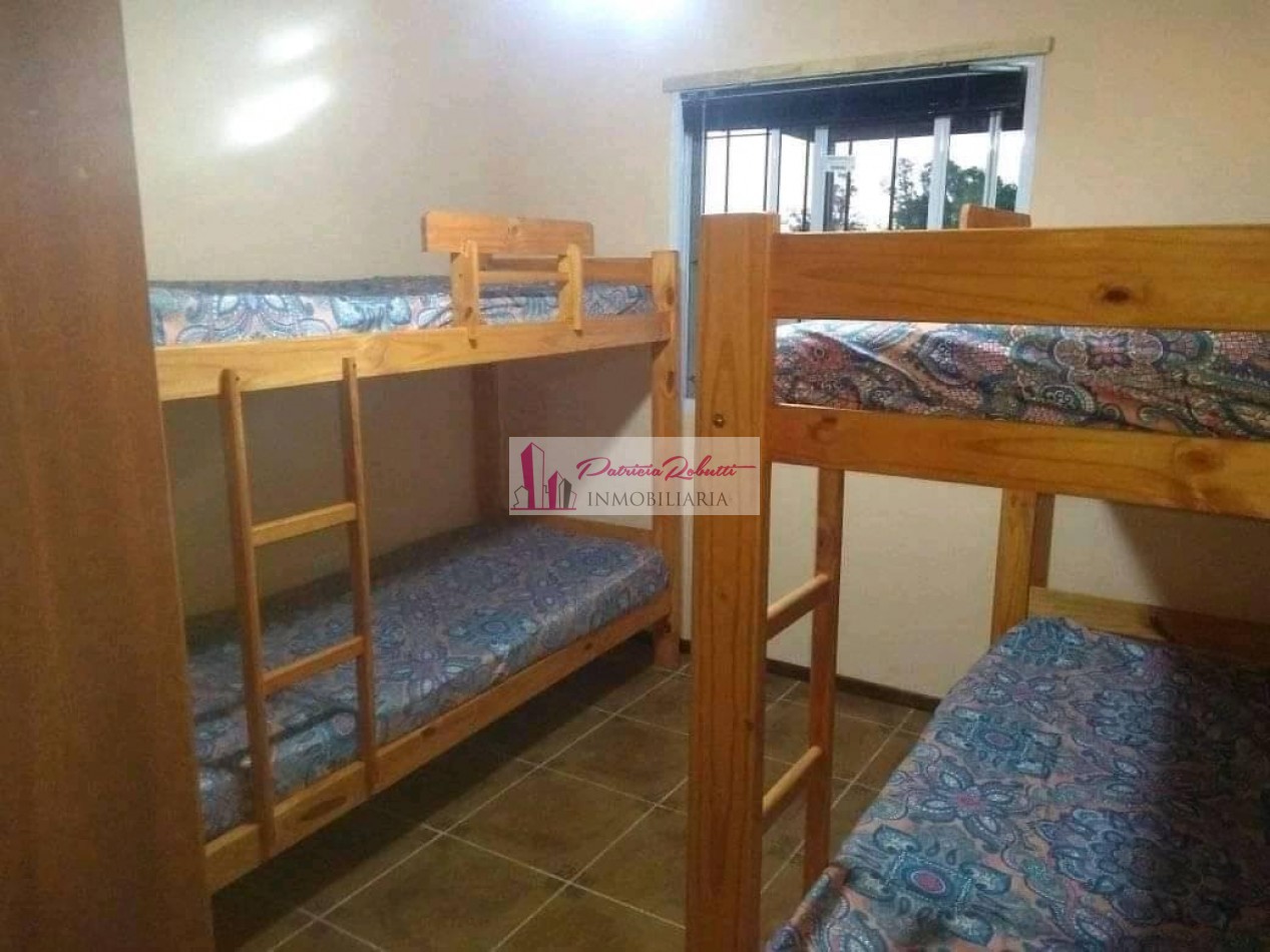 EN VENTA CASA 4 AMBIENTES CON LOTE LIBRE EN BRANDSEN